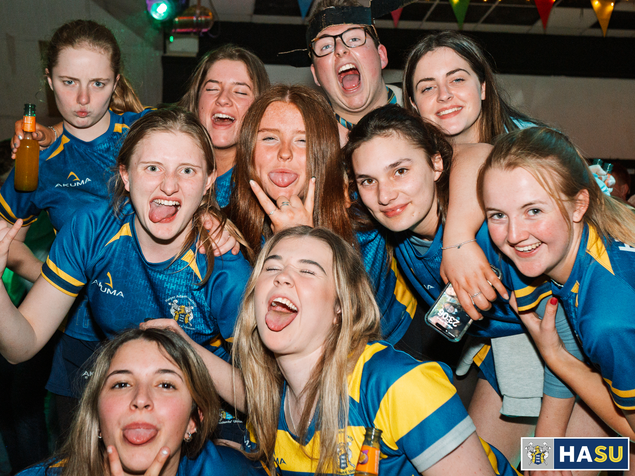 A sports team making faces enjoying their time at the Flock